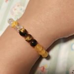 Customer wearing a crystal bracelet during everyday activities