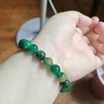 Customer wearing a Five Element bracelet on their wrist