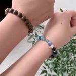 Customer styling a Five Element bracelet with everyday clothing
