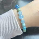 Customer wearing a natural crystal bracelet from LuckyAnyway
