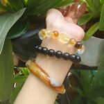 Customer wearing a personal crystal bracelet inspired by Five Elements