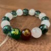 Bracelet representing traditional Chinese wishes for good fortune and blessings